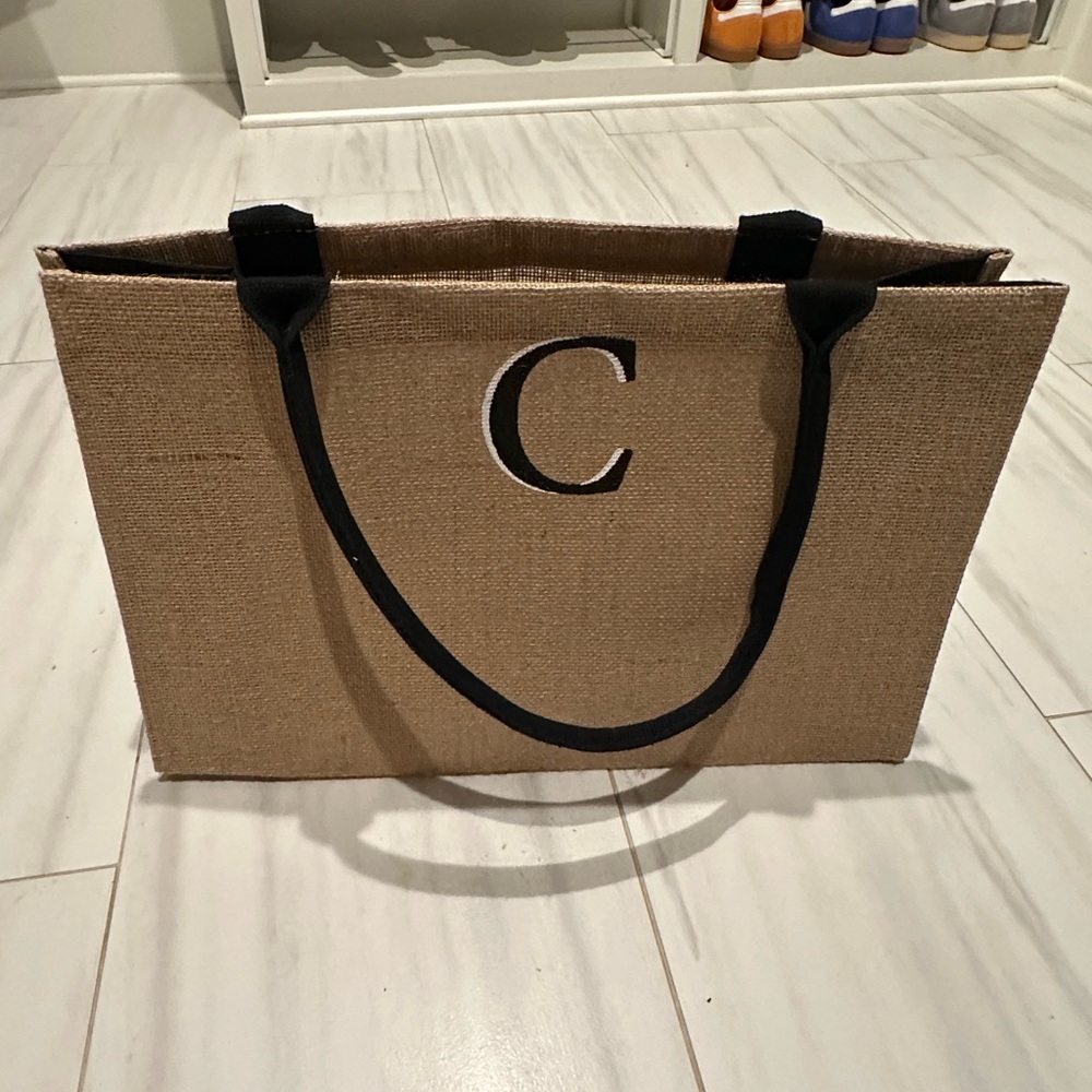 Chic Tan Tote Bag with Black Handles